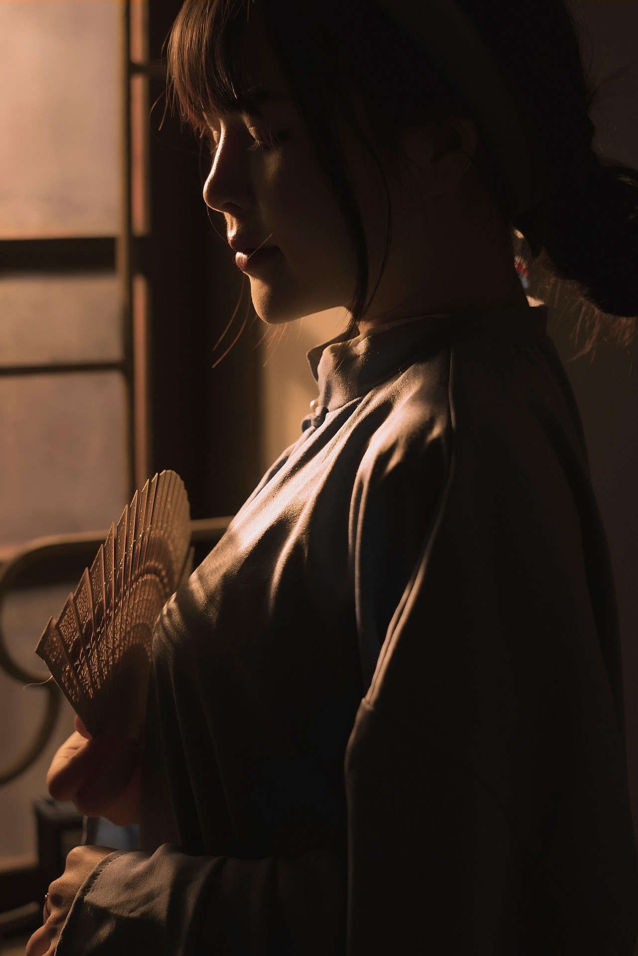 Smiling person in soft window light